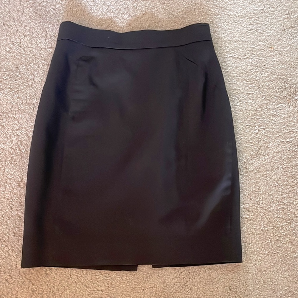 Women’s black pencil skirt.